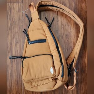 Free People Sling bag/ backpack (NWOT)